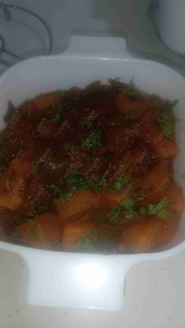 Tasty Aloo Shimla Mirch cooked by COOX chefs cooks during occasions parties events at home