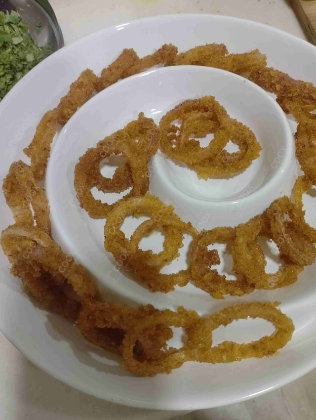 Tasty Onion Rings cooked by COOX chefs cooks during occasions parties events at home