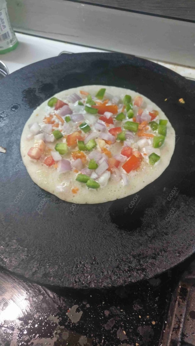 Tasty Mixed Veg Uttappam cooked by COOX chefs cooks during occasions parties events at home