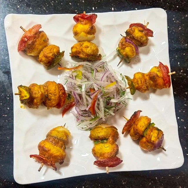 Tasty Mushroom Tikka cooked by COOX chefs cooks during occasions parties events at home