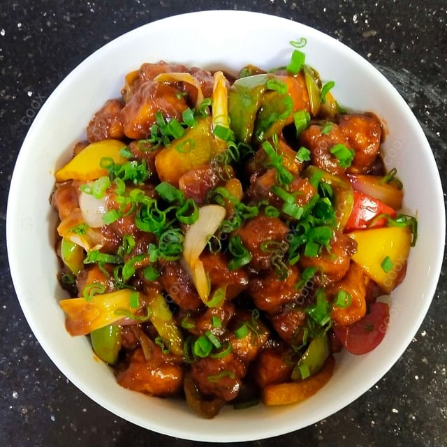 Tasty Chilli  Chicken cooked by COOX chefs cooks during occasions parties events at home