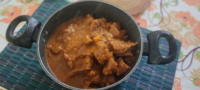 Tasty Mutton Korma cooked by COOX chefs cooks during occasions parties events at home