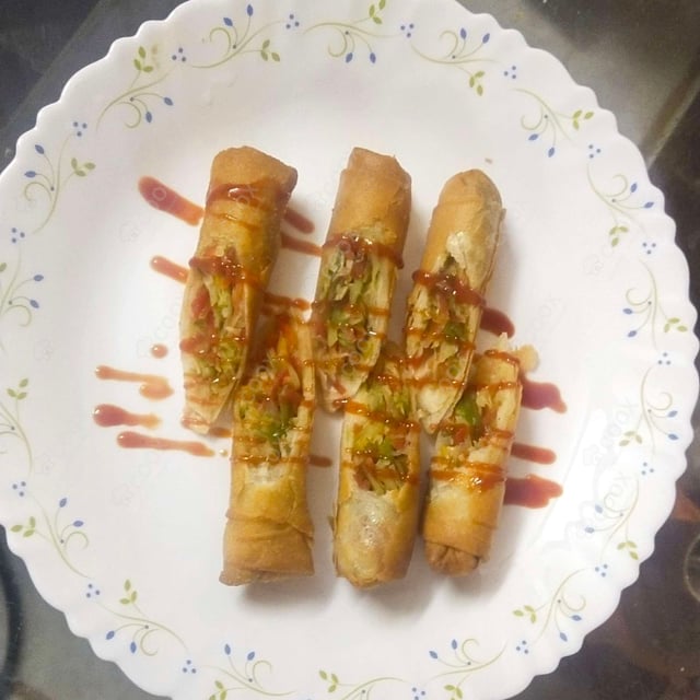 Tasty Veg Spring Rolls cooked by COOX chefs cooks during occasions parties events at home