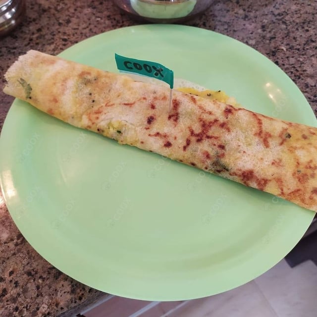 Tasty Rava Masala Dosa cooked by COOX chefs cooks during occasions parties events at home