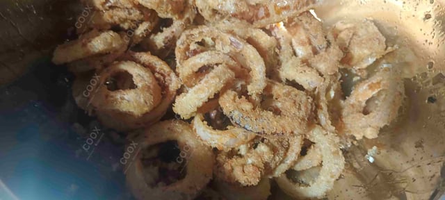 Tasty Onion Rings cooked by COOX chefs cooks during occasions parties events at home
