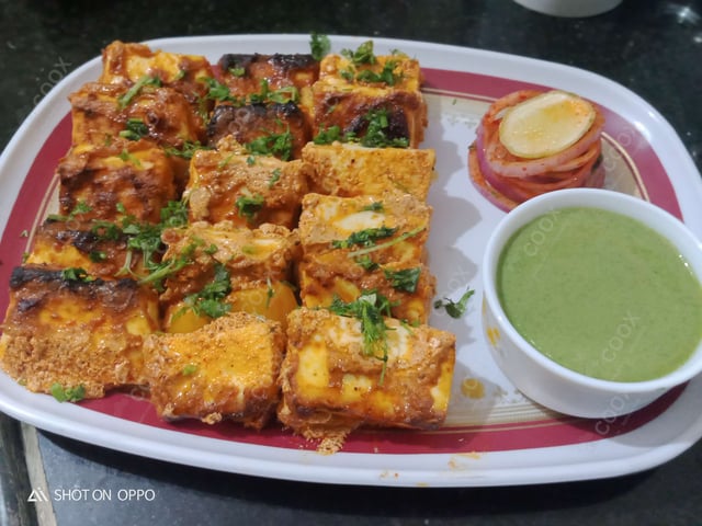 Tasty Paneer Tikka cooked by COOX chefs cooks during occasions parties events at home