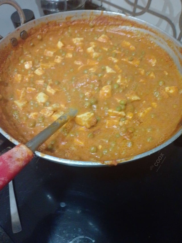 Delicious Matar Paneer prepared by COOX