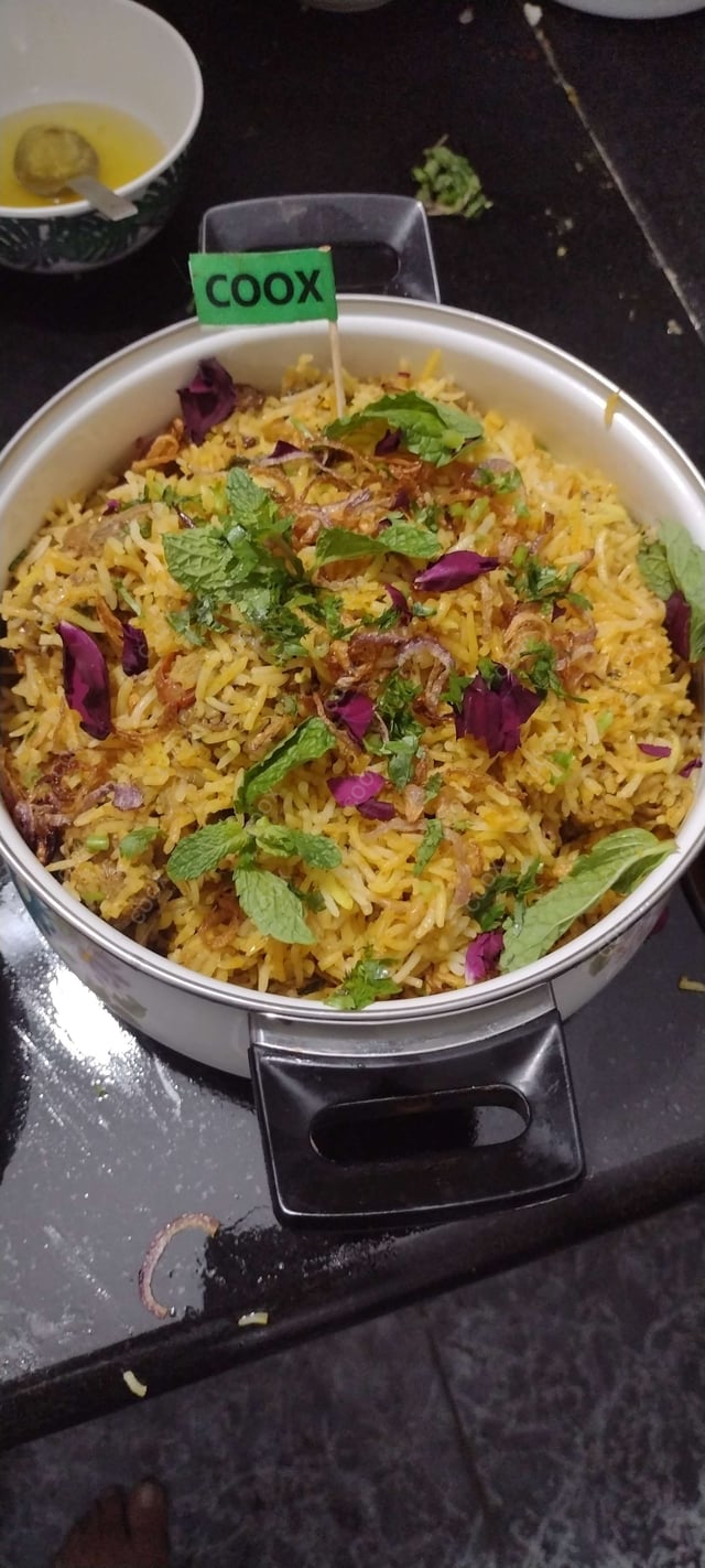 Tasty Mutton Biryani cooked by COOX chefs cooks during occasions parties events at home