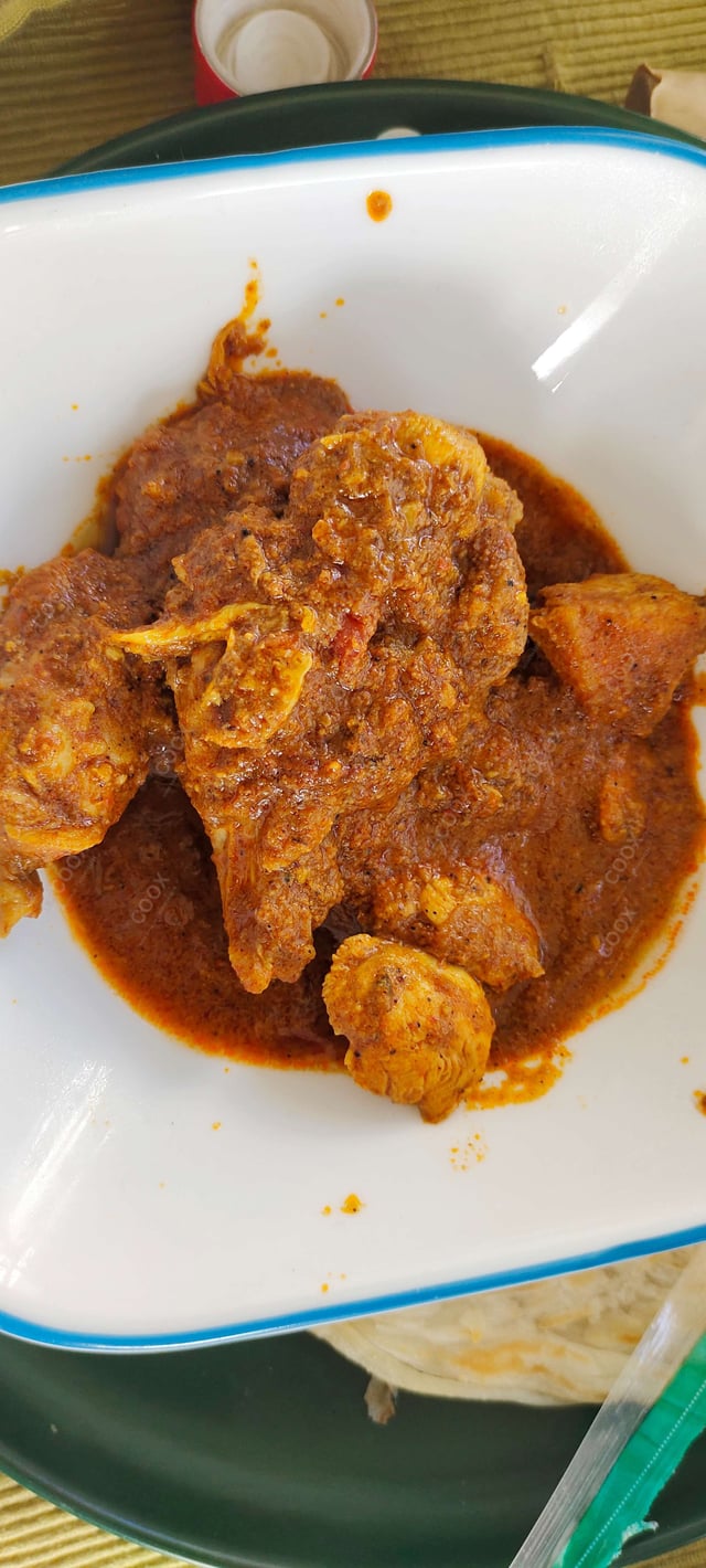 Tasty Chicken Curry cooked by COOX chefs cooks during occasions parties events at home