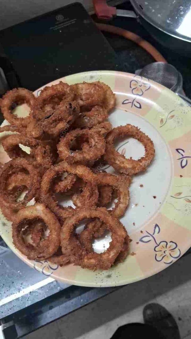 Tasty Onion Rings cooked by COOX chefs cooks during occasions parties events at home