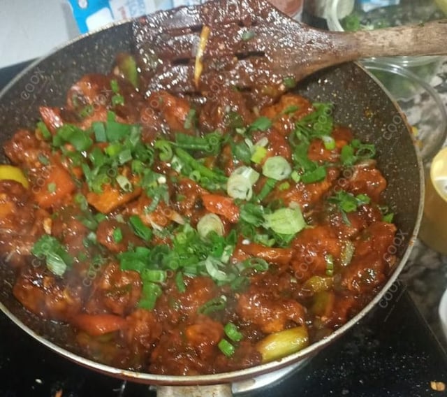 Tasty Chilli Chicken cooked by COOX chefs cooks during occasions parties events at home