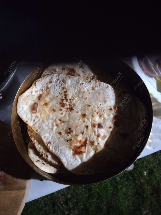 Delicious Naan (Butter / Garlic) prepared by COOX