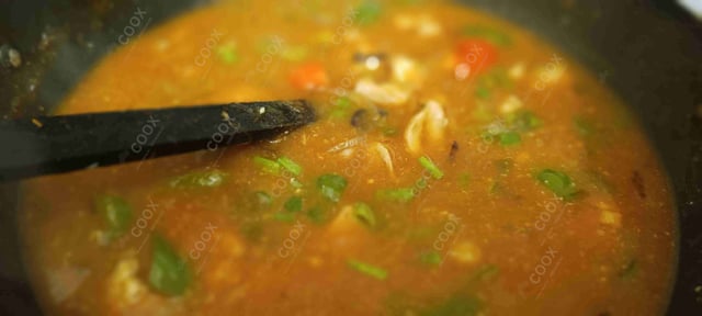 Tasty Chicken in Schezwan Sauce cooked by COOX chefs cooks during occasions parties events at home