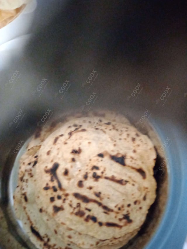 Delicious Lachha Parathas prepared by COOX