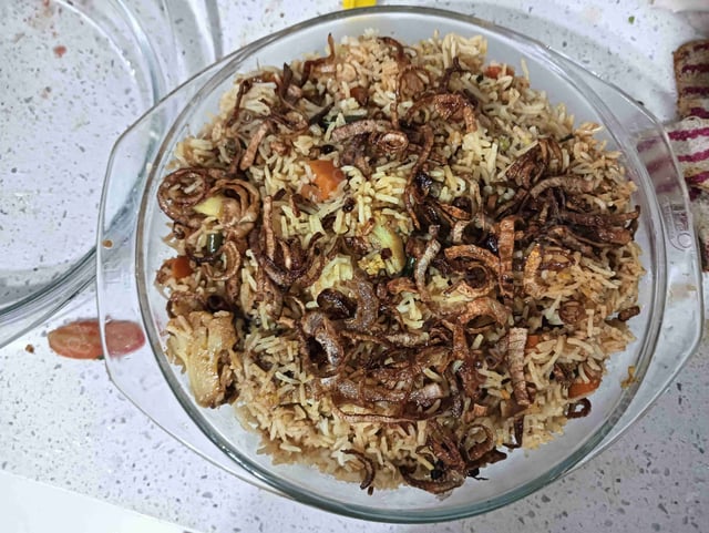 Delicious Veg Biryani prepared by COOX