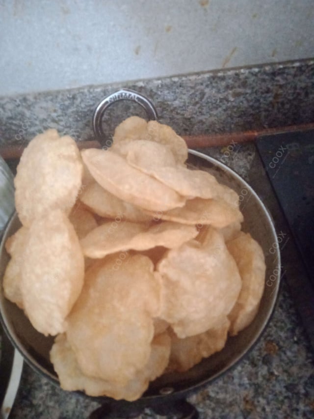 Delicious Pooris & Bedmis prepared by COOX