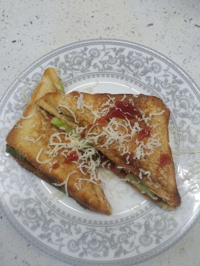 Tasty Grilled Veg Sandwiches cooked by COOX chefs cooks during occasions parties events at home