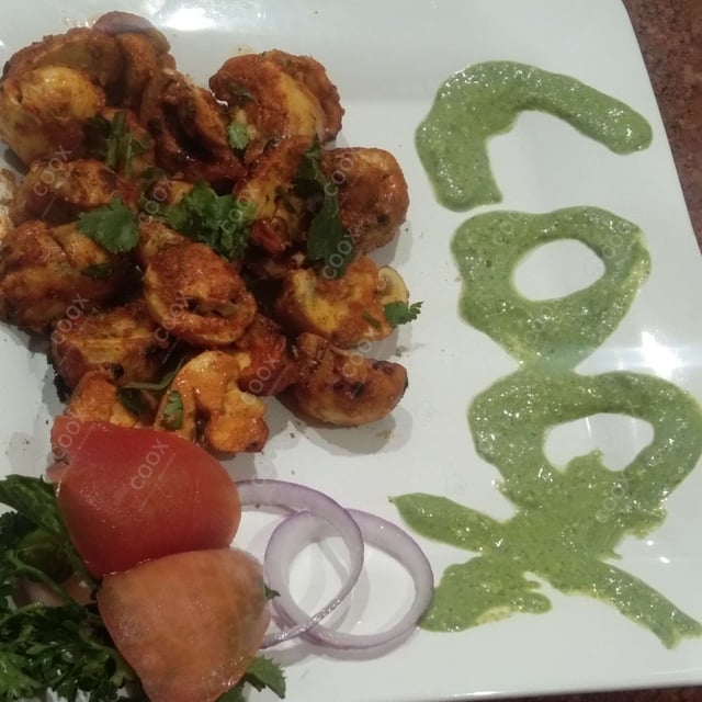 Tasty Mushroom Tikka cooked by COOX chefs cooks during occasions parties events at home