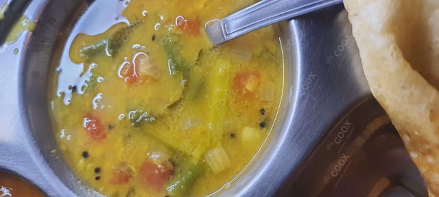 Tasty Sambhar cooked by COOX chefs cooks during occasions parties events at home