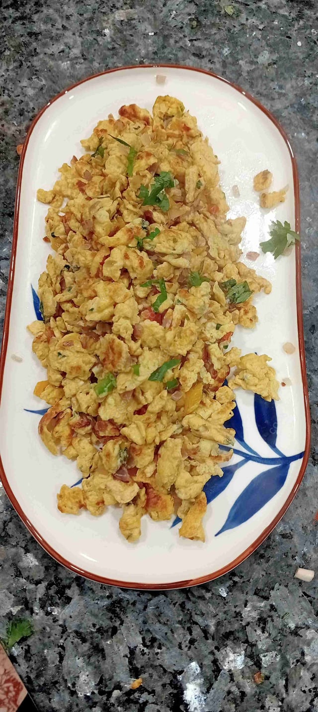 Tasty Egg Bhurji cooked by COOX chefs cooks during occasions parties events at home