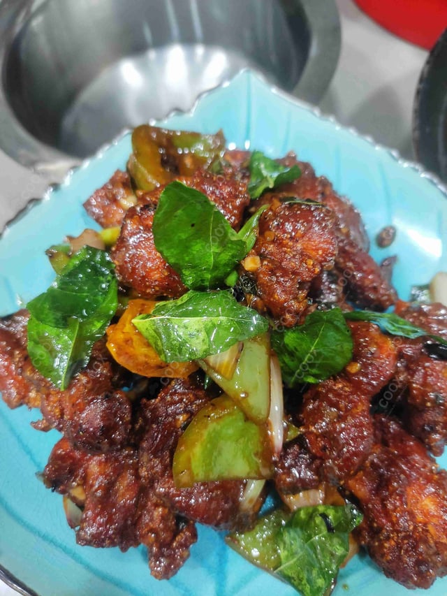 Tasty Chicken 65 cooked by COOX chefs cooks during occasions parties events at home