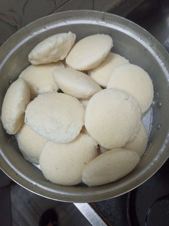 Tasty Rava Idli cooked by COOX chefs cooks during occasions parties events at home