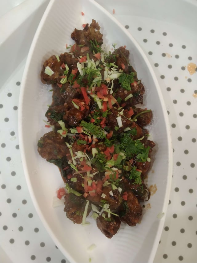 Tasty Chilli Chicken cooked by COOX chefs cooks during occasions parties events at home