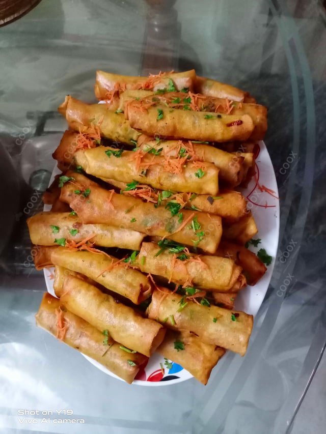 Tasty Chicken Spring Rolls cooked by COOX chefs cooks during occasions parties events at home