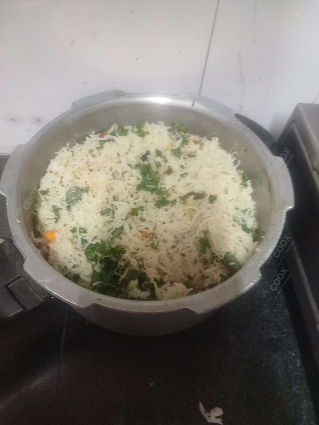 Delicious Jeera Rice prepared by COOX