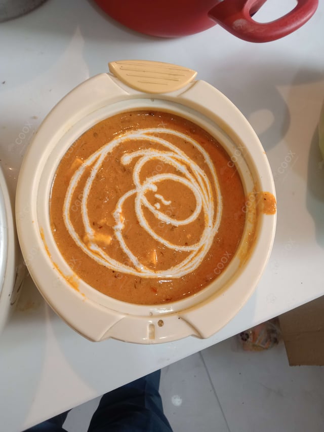 Tasty Paneer Butter Masala cooked by COOX chefs cooks during occasions parties events at home