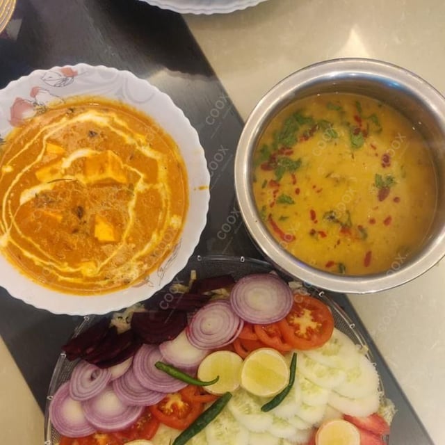 Tasty Dal Tadka cooked by COOX chefs cooks during occasions parties events at home