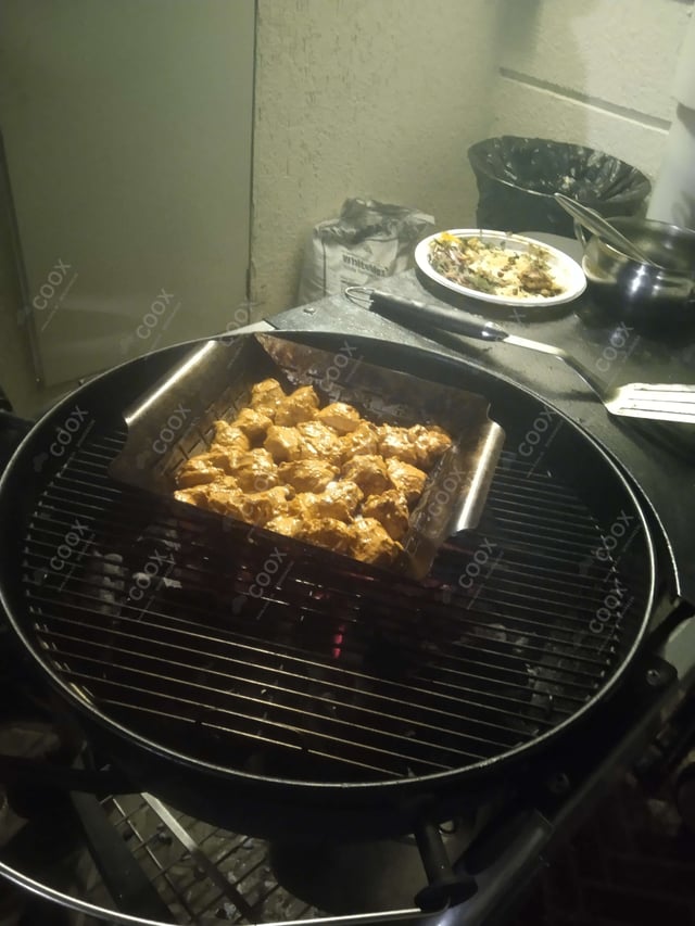 Delicious Murgh Malai Tikka prepared by COOX