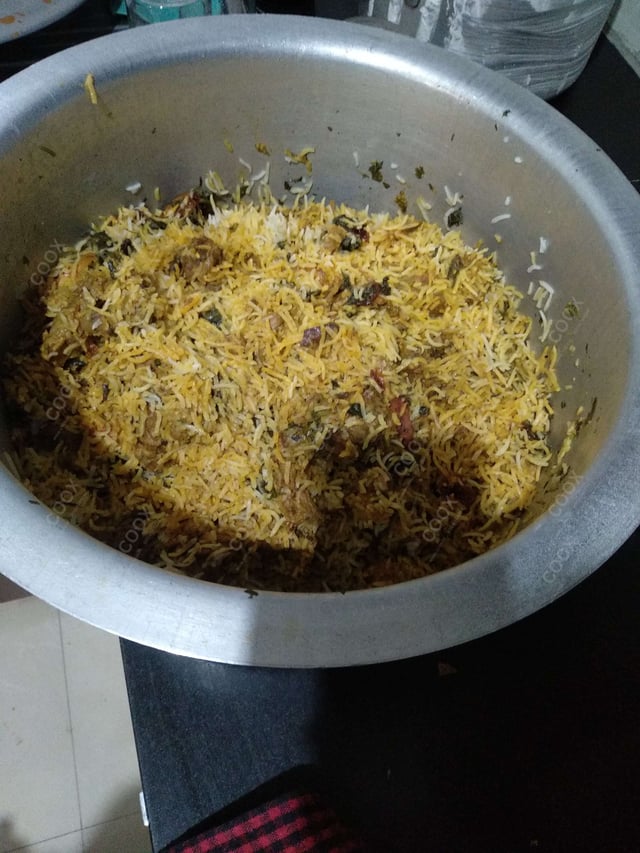 Tasty Mutton Biryani cooked by COOX chefs cooks during occasions parties events at home