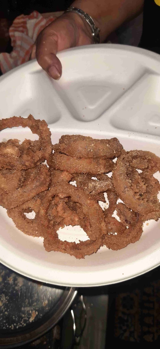 Tasty Onion Rings cooked by COOX chefs cooks during occasions parties events at home