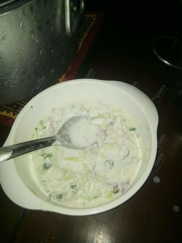 Tasty Boondi Raita cooked by COOX chefs cooks during occasions parties events at home