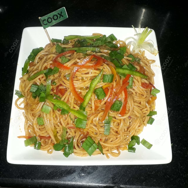 Tasty Veg Hakka Noodles cooked by COOX chefs cooks during occasions parties events at home