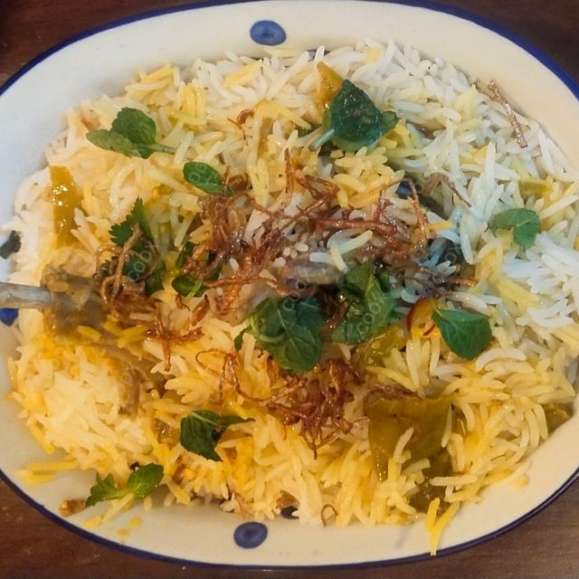 Tasty Mutton Biryani cooked by COOX chefs cooks during occasions parties events at home