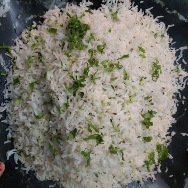 Tasty Jeera Rice cooked by COOX chefs cooks during occasions parties events at home