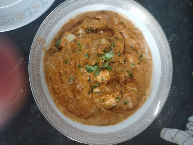 Tasty Paneer Butter Masala cooked by COOX chefs cooks during occasions parties events at home