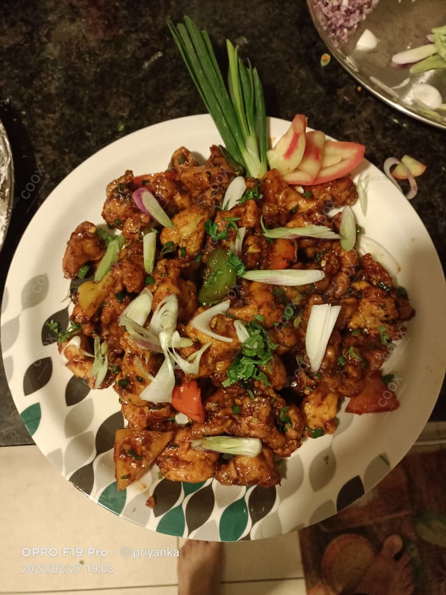 Tasty Chilli Chicken cooked by COOX chefs cooks during occasions parties events at home