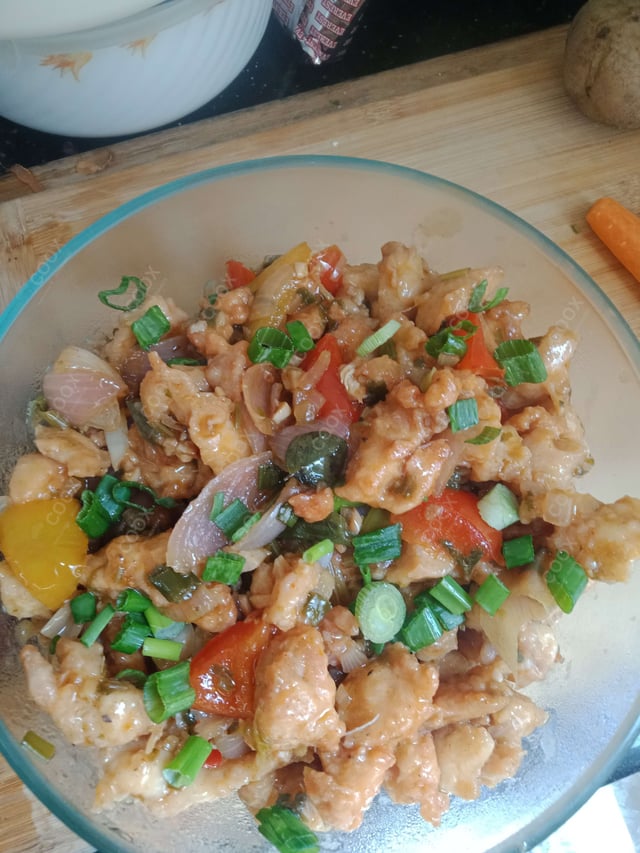 Tasty Chilli Chicken cooked by COOX chefs cooks during occasions parties events at home