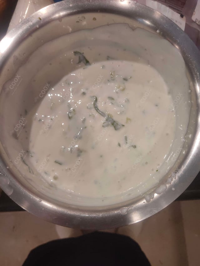 Tasty Cucumber Raita cooked by COOX chefs cooks during occasions parties events at home