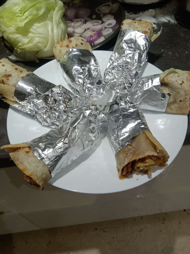 Tasty Mutton Kathi Rolls cooked by COOX chefs cooks during occasions parties events at home