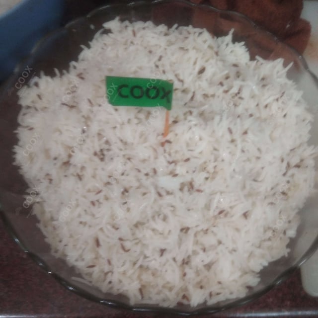 Tasty Jeera Rice cooked by COOX chefs cooks during occasions parties events at home