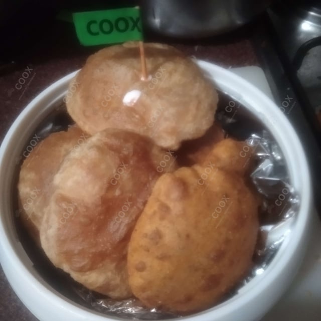 Tasty Pooris & Bedmis cooked by COOX chefs cooks during occasions parties events at home