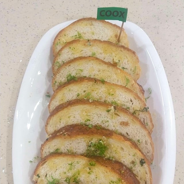Tasty Garlic Bread with Cheese cooked by COOX chefs cooks during occasions parties events at home