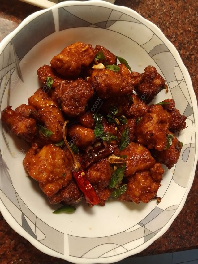 Tasty Chicken 65 cooked by COOX chefs cooks during occasions parties events at home