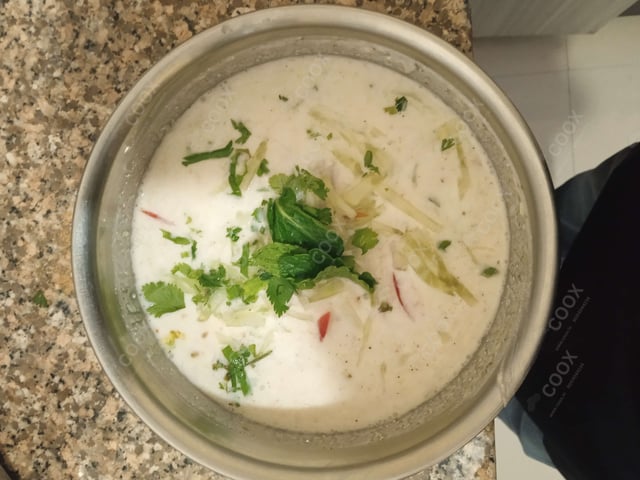 Tasty Cucumber Raita cooked by COOX chefs cooks during occasions parties events at home