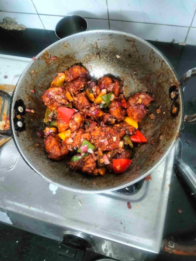 Tasty Red Chilli Prawns cooked by COOX chefs cooks during occasions parties events at home