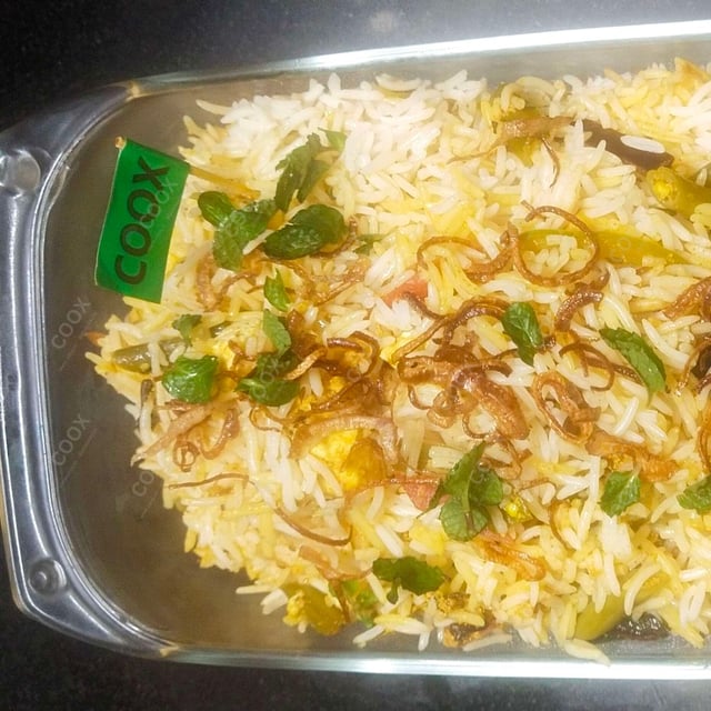 Tasty Veg Biryani cooked by COOX chefs cooks during occasions parties events at home